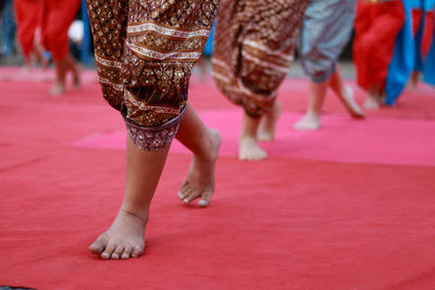 Low section of women dancing on stage