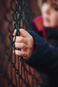 Holding metal fence 