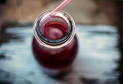 Close-up of drink in glass jar on table