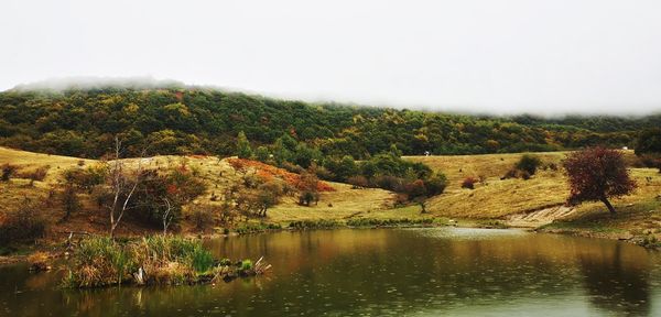 Scenic view of lake against clear sky