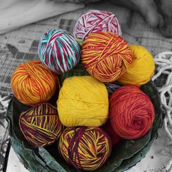 Close-up of multi colored balls of wool