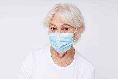 Portrait of senior woman wearing mask