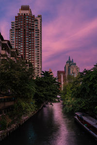 Buildings in city against sky