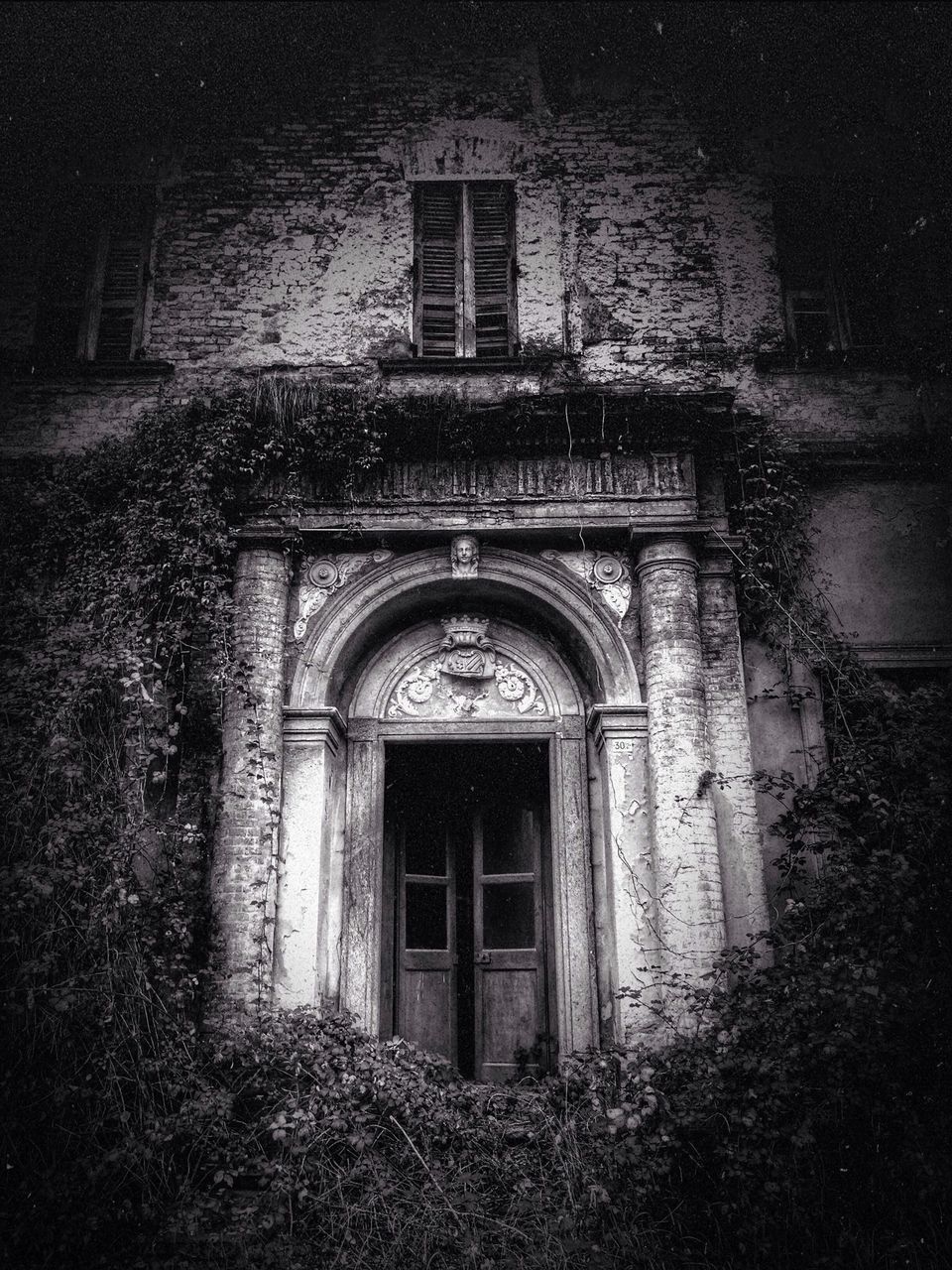 architecture, built structure, building exterior, window, door, house, arch, entrance, closed, facade, old, residential structure, residential building, doorway, day, outdoors, no people, building, wall, stone wall