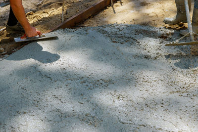 Low section of person working in water