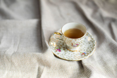 High angle view of coffee cup on table