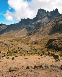 Scenic view of rocky mountains against sky, mount kenya national park, kenya 
