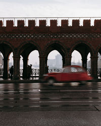 Blurred motion of car on street during rainy season