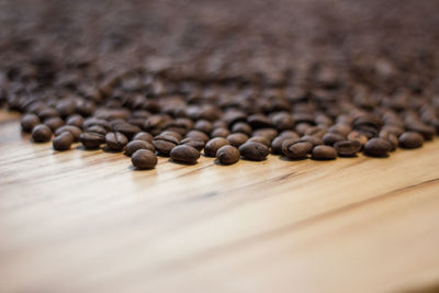 Close-up of coffee beans on table