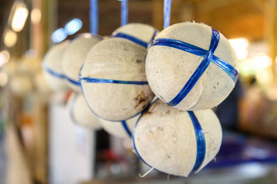 Close-up of bell hanging at market stall