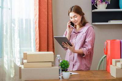 Young woman using mobile phone