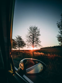 View of car on side-view mirror