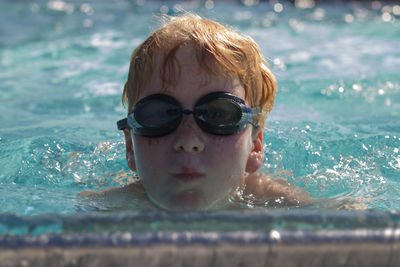 Portrait of boy in swimming pool