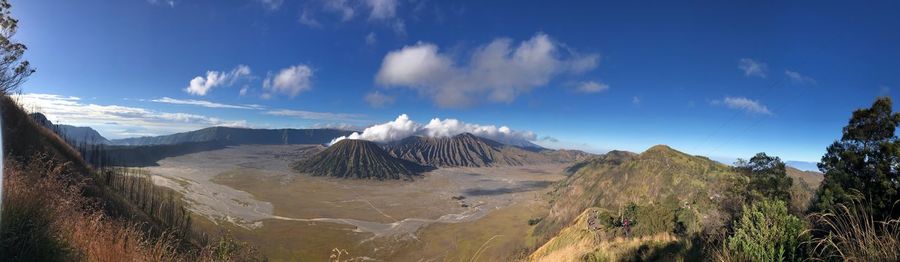 Panoramic view of volcanic landscape against sky