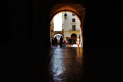 People in corridor of building