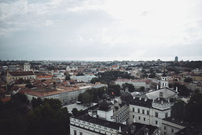 Aerial view of town against sky