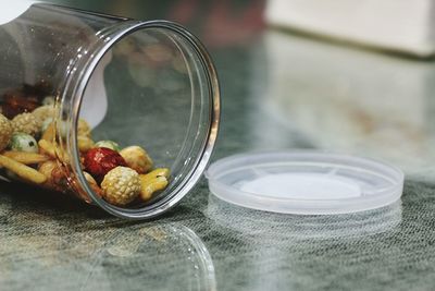 Close-up of food in jar on table