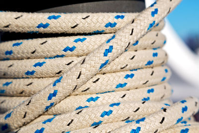 Close-up of rope tied on stack
