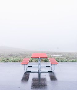 Empty benches in the dark
