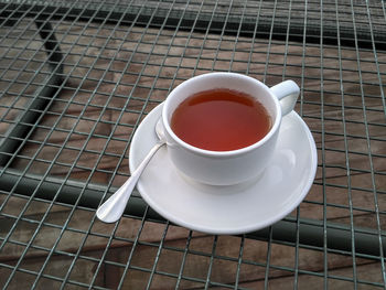 Close-up of tea cup on table