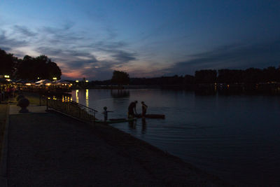 Scenic view of sea against sky at night