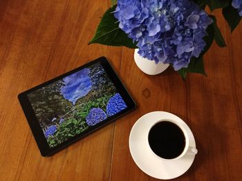 High angle view of coffee cup on table