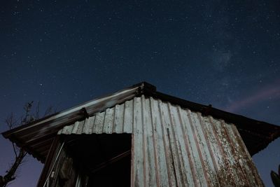 Low angle view of building against sky at night