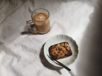 High angle view of coffee served on table