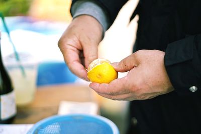 Close-up of hand holding apple