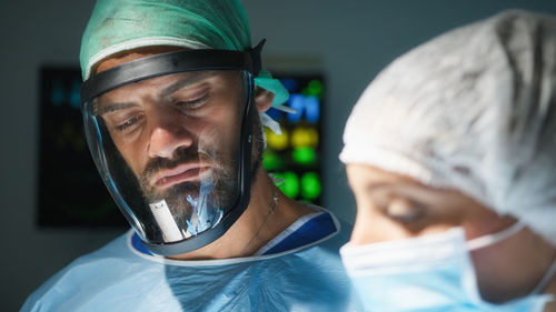 Medical team examine x-ray in surgery room