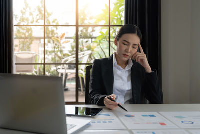 Businesswoman working at office