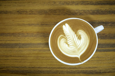 Directly above shot of cappuccino on table