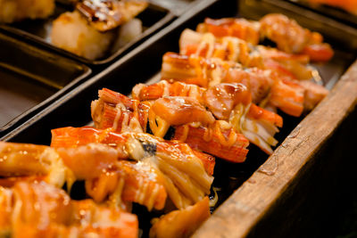 High angle view of serving meat on barbecue grill