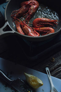 Spot prawns shrimp seafood in butter garlic parsley camping outdoors