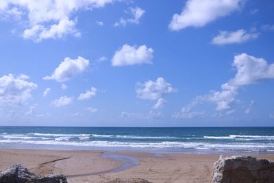 Scenic view of beach against sky