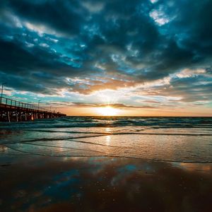 Scenic view of sea against cloudy sky