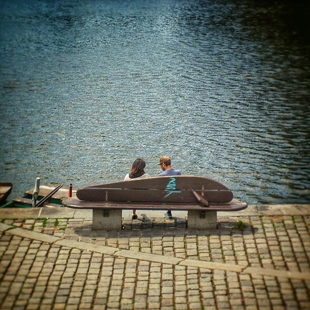 water, lifestyles, men, leisure activity, sitting, rear view, togetherness, nautical vessel, person, lake, transportation, sea, boat, relaxation, bonding, pier, high angle view