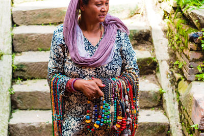 Full length of woman standing outdoors