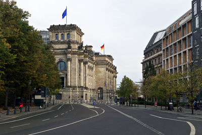 Reichstag german parliament and empty street, germany, berlin