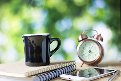 Close-up of coffee cup on table