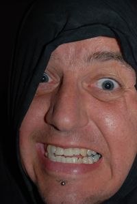 Close-up portrait of mid adult man