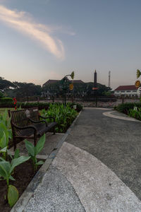 View of footpath with buildings in background