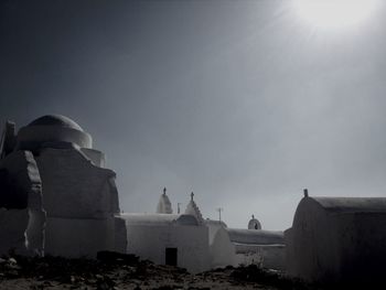 Silhouette of fort against sky