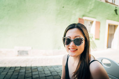 Young woman wearing sunglasses