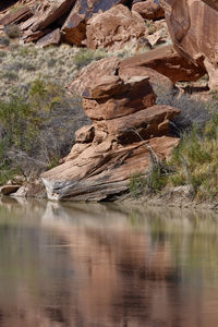 Scenic view of rock formation in lake