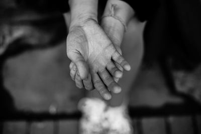 Cropped hands of woman