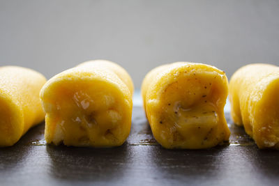 Close-up of yellow fruits on table