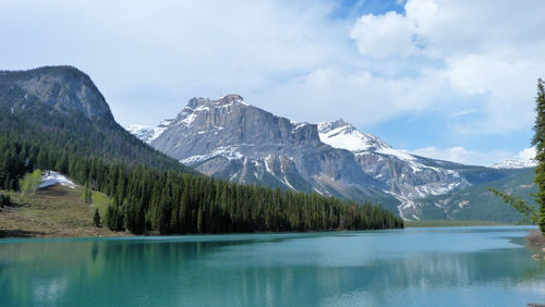 Scenic view of lake with mountains in background