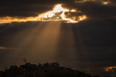 Scenic view of dramatic sky during sunset