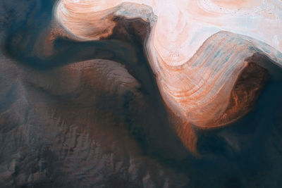 High angle view of rock formation in sea